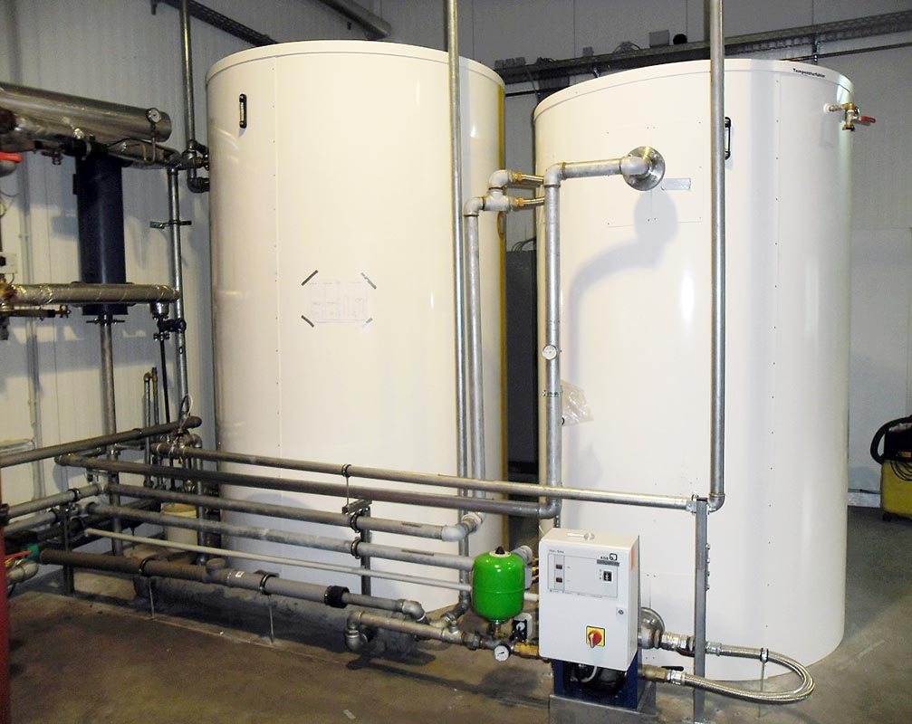 The fully assembled hot water tanks for storing waste heat.